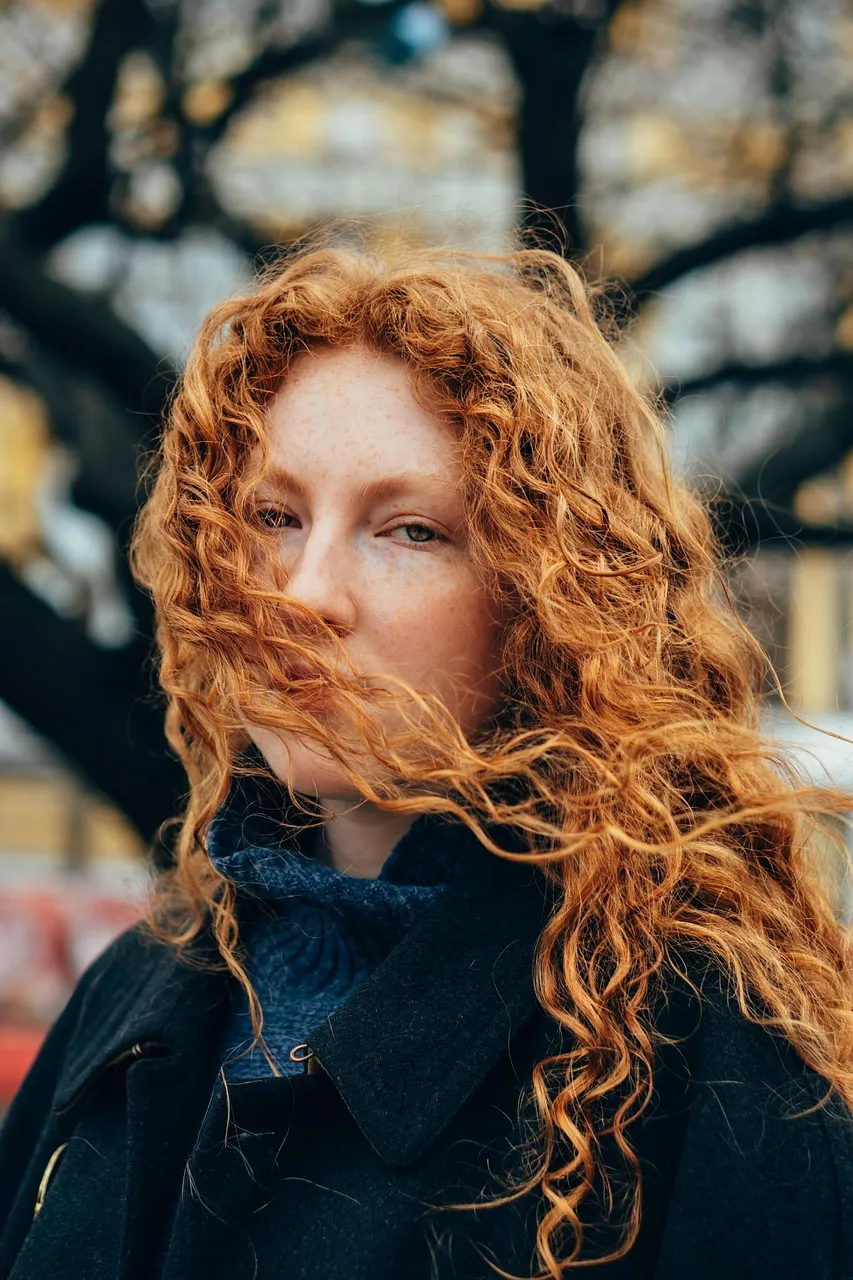 Long natural red curls, loose and full